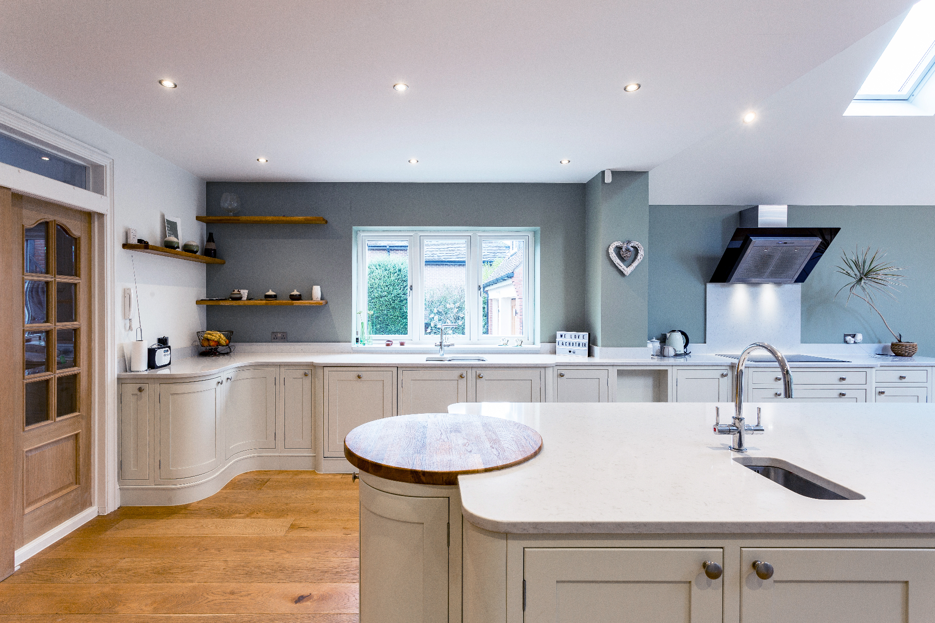 Bespoke shaker kitchen with curved island and quartz worktops