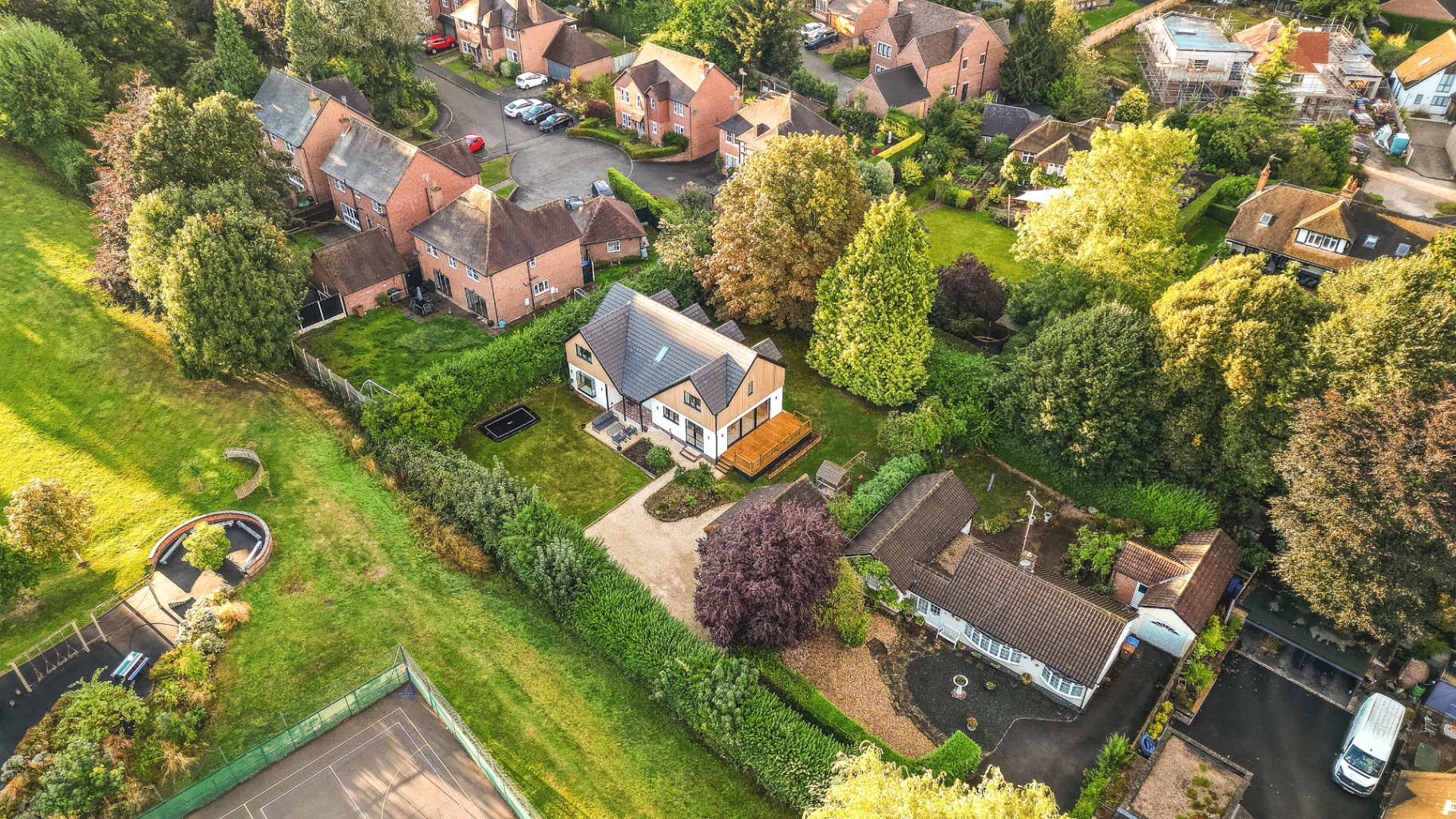 Wide aerial view showing the Darley Abbey home within its wider neighbourhood setting